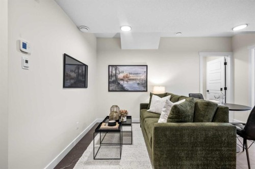 203 Huxland Path Ne, Calgary, AB - Indoor Photo Showing Living Room