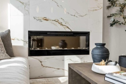203 Huxland Path Ne, Calgary, AB - Indoor With Fireplace