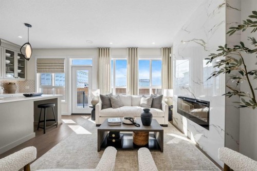 203 Huxland Path Ne, Calgary, AB - Indoor Photo Showing Living Room With Fireplace