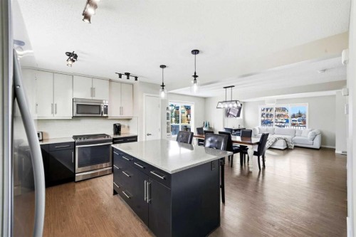 157 Fireside Circle Nw, Cochrane, AB - Indoor Photo Showing Kitchen With Upgraded Kitchen