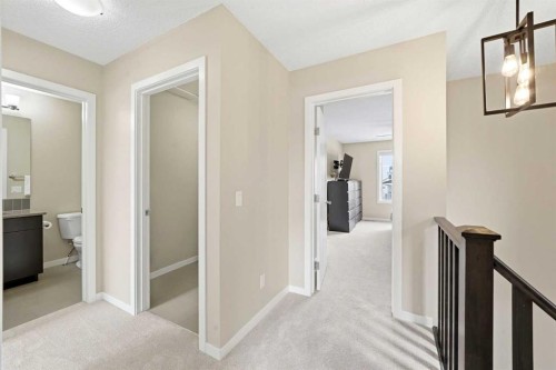 157 Fireside Circle Nw, Cochrane, AB - Indoor Photo Showing Other Room