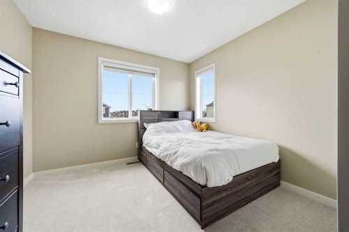 157 Fireside Circle Nw, Cochrane, AB - Indoor Photo Showing Bedroom