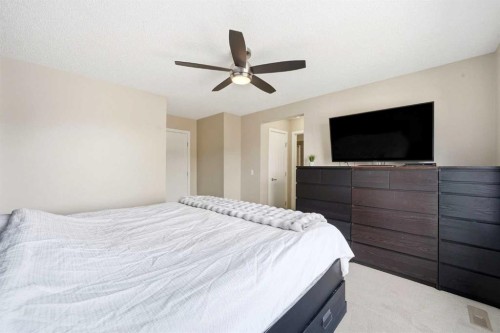 157 Fireside Circle Nw, Cochrane, AB - Indoor Photo Showing Bedroom