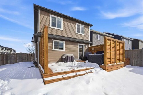 157 Fireside Circle Nw, Cochrane, AB - Outdoor With Deck Patio Veranda With Exterior