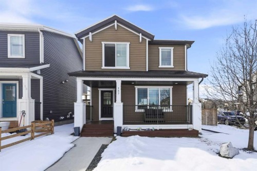 157 Fireside Circle Nw, Cochrane, AB - Outdoor With Deck Patio Veranda With Facade