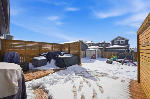 157 Fireside Circle Nw, Cochrane, AB - Outdoor With Deck Patio Veranda With Exterior
