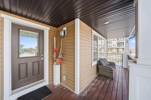157 Fireside Circle Nw, Cochrane, AB - Outdoor With Deck Patio Veranda With Exterior