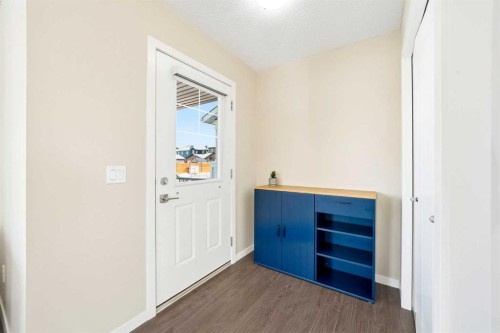 157 Fireside Circle Nw, Cochrane, AB - Indoor Photo Showing Other Room