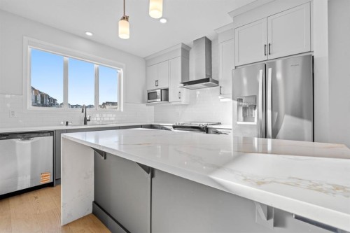 153 Edith Way Nw, Calgary, AB - Indoor Photo Showing Kitchen With Stainless Steel Kitchen With Upgraded Kitchen