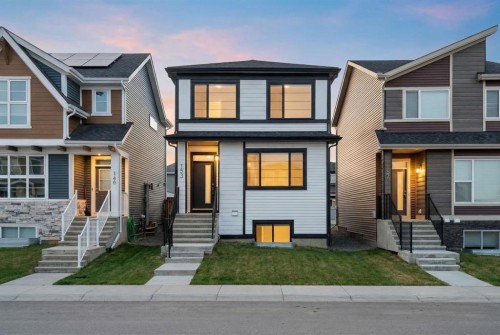 153 Edith Way Nw, Calgary, AB - Outdoor With Facade
