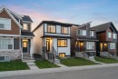 153 Edith Way Nw, Calgary, AB  - Outdoor With Facade 