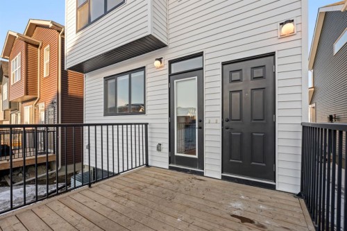 153 Edith Way Nw, Calgary, AB - Outdoor With Exterior