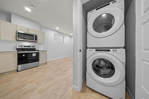 153 Edith Way Nw, Calgary, AB - Indoor Photo Showing Laundry Room