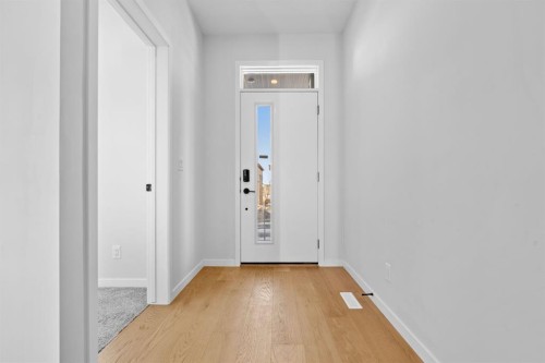 153 Edith Way Nw, Calgary, AB - Indoor Photo Showing Other Room