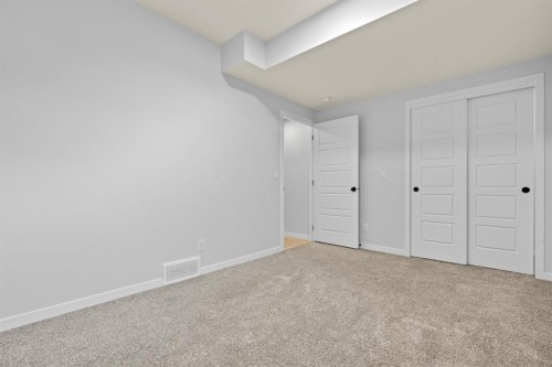 153 Edith Way Nw, Calgary, AB - Indoor Photo Showing Other Room