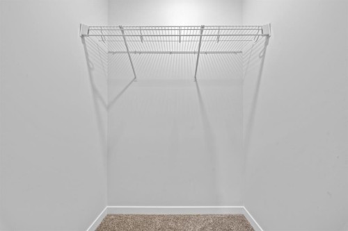 153 Edith Way Nw, Calgary, AB - Indoor With Storage