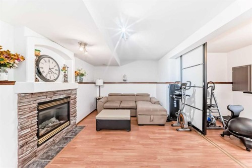 435 Coventry Road Ne, Calgary, AB - Indoor With Fireplace