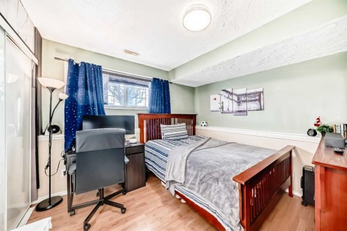 435 Coventry Road Ne, Calgary, AB - Indoor Photo Showing Bedroom
