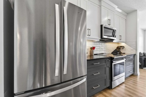 83 Seton Heath Se, Calgary, AB - Indoor Photo Showing Kitchen With Upgraded Kitchen