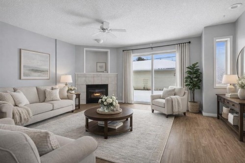 3101 39 Street Sw, Calgary, AB - Indoor Photo Showing Living Room With Fireplace