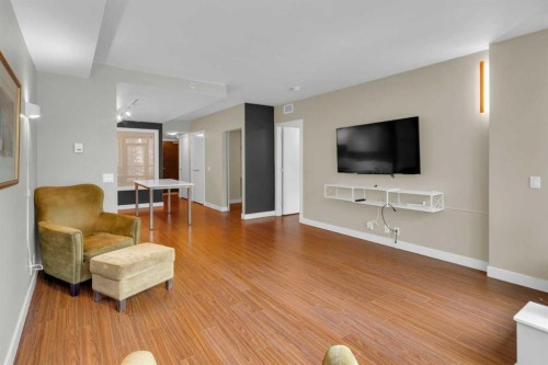 251-222 Riverfront Avenue Sw, Calgary, AB - Indoor Photo Showing Living Room