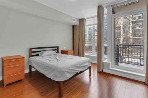 251-222 Riverfront Avenue Sw, Calgary, AB - Indoor Photo Showing Bedroom