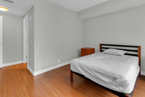 251-222 Riverfront Avenue Sw, Calgary, AB - Indoor Photo Showing Bedroom