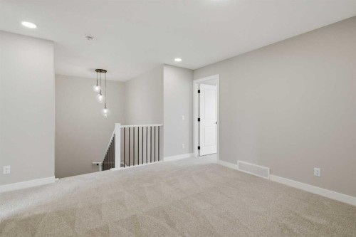 139 Belvedere Crescent Se, Calgary, AB - Indoor Photo Showing Other Room
