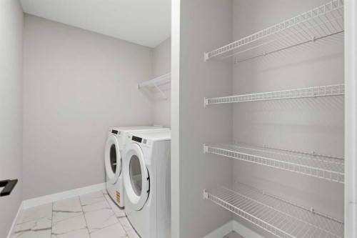 139 Belvedere Crescent Se, Calgary, AB - Indoor Photo Showing Laundry Room