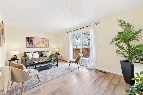 3-6100 4 Avenue Ne, Calgary, AB - Indoor Photo Showing Living Room