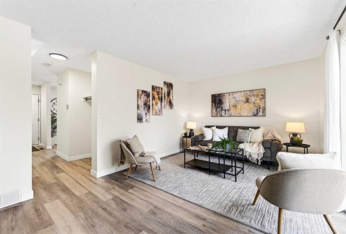 3-6100 4 Avenue Ne, Calgary, AB - Indoor Photo Showing Living Room