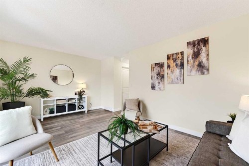 3-6100 4 Avenue Ne, Calgary, AB - Indoor Photo Showing Living Room