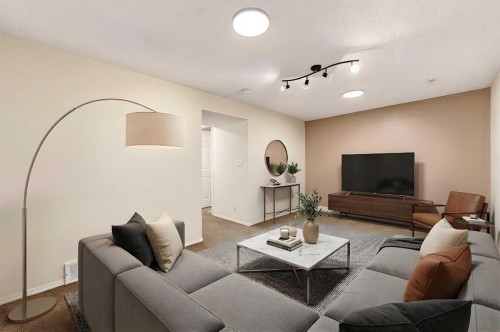 3-6100 4 Avenue Ne, Calgary, AB - Indoor Photo Showing Living Room