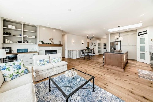 44 Eagleview Heights, Cochrane, AB - Indoor Photo Showing Living Room With Fireplace