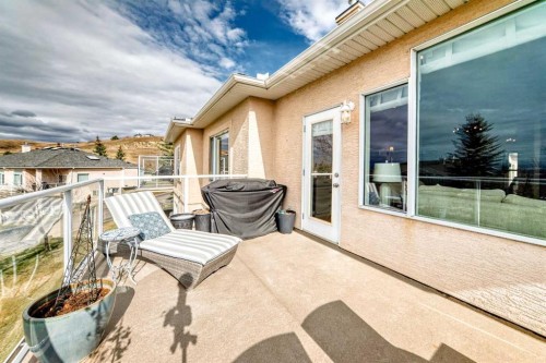 44 Eagleview Heights, Cochrane, AB - Outdoor With Deck Patio Veranda With Exterior