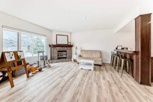 44 Eagleview Heights, Cochrane, AB - Indoor With Fireplace