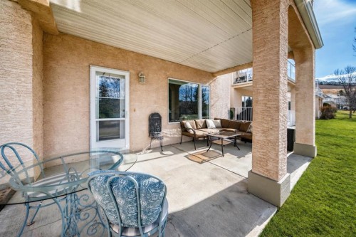 44 Eagleview Heights, Cochrane, AB - Outdoor With Deck Patio Veranda With Exterior
