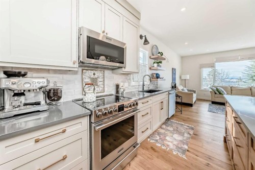 44 Eagleview Heights, Cochrane, AB - Indoor Photo Showing Kitchen With Upgraded Kitchen