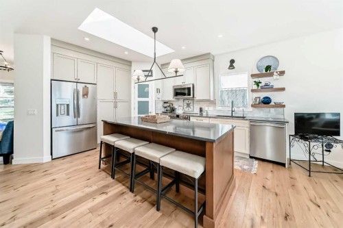 44 Eagleview Heights, Cochrane, AB - Indoor Photo Showing Kitchen With Upgraded Kitchen