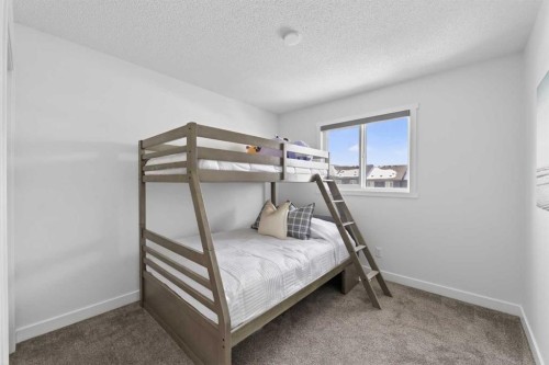 29 Carringvue Way Nw, Calgary, AB - Indoor Photo Showing Bedroom