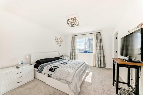 91 Walcrest Way Se, Calgary, AB - Indoor Photo Showing Bedroom