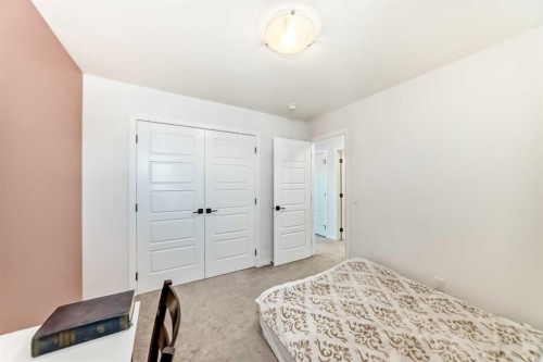 91 Walcrest Way Se, Calgary, AB - Indoor Photo Showing Bedroom