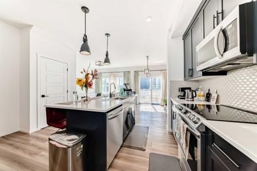 91 Walcrest Way Se, Calgary, AB - Indoor Photo Showing Kitchen With Upgraded Kitchen