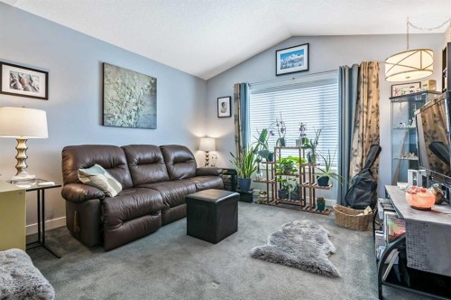 61 Drake Landing Loop, Okotoks, AB - Indoor Photo Showing Living Room