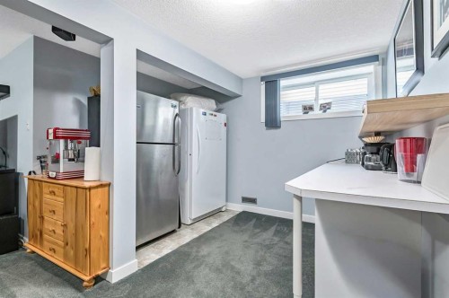 61 Drake Landing Loop, Okotoks, AB - Indoor Photo Showing Other Room
