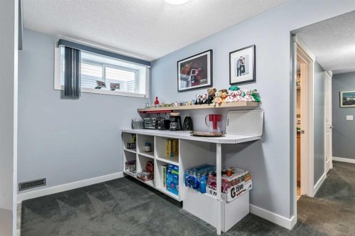61 Drake Landing Loop, Okotoks, AB - Indoor Photo Showing Other Room
