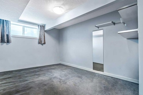 61 Drake Landing Loop, Okotoks, AB - Indoor Photo Showing Other Room