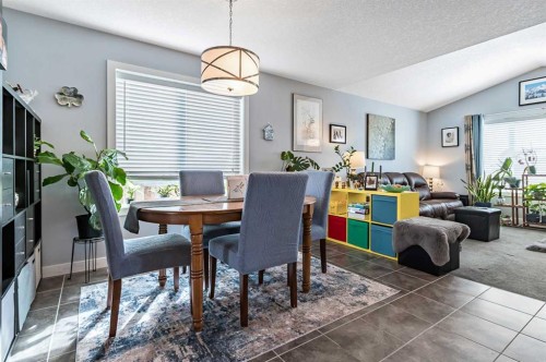 61 Drake Landing Loop, Okotoks, AB - Indoor Photo Showing Dining Room