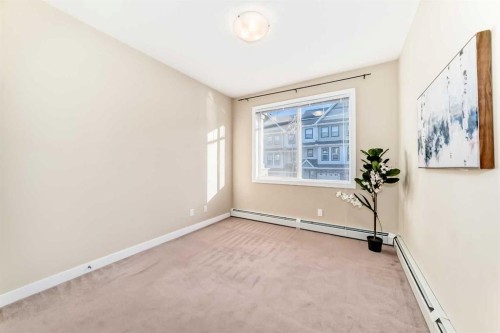203-48 Panatella Road Nw, Calgary, AB - Indoor Photo Showing Other Room