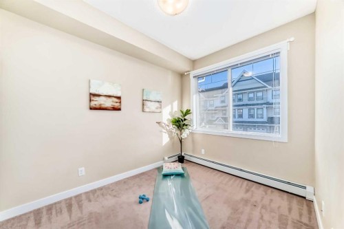 203-48 Panatella Road Nw, Calgary, AB - Indoor Photo Showing Other Room